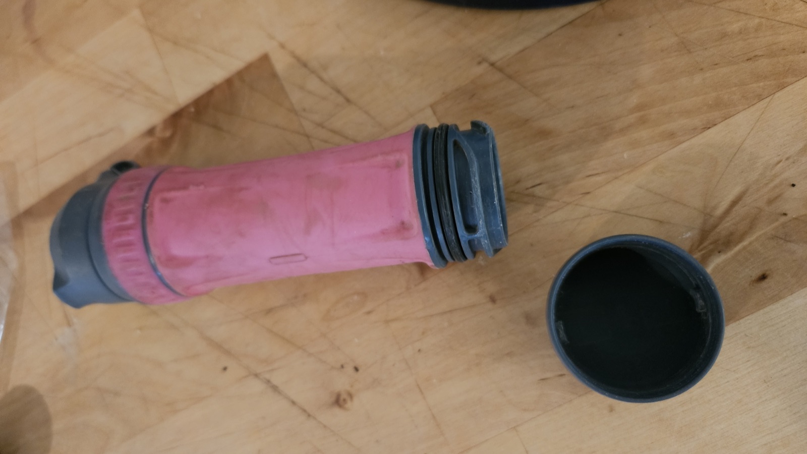Platypus QuickDraw filter with its dirty-side cap removed, showing the threaded end